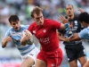 Canada's Jake Thiel fends off the Argentina defense on day one of the HSBC Cape Town Sevens 2019 men's competition on 13 December, 2019. Photo credit: Mike Lee - KLC fotos for World Rugby