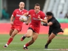 Wales' Jay Jones breaks through the New Zealand defense on day one of the HSBC Cape Town Sevens 2019 men's competition on 13 December, 2019. Photo credit: Mike Lee - KLC fotos for World Rugby
