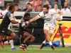 USA's Danny Barrett charges through the Fiji defense on day one of the HSBC Cape Town Sevens 2019 men's competition on 13 December, 2019. Photo credit: Mike Lee - KLC fotos for World Rugby