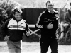 08022011 sport Photo JOHN SELKIRK/auckland bureau. Andy Dalton,The all black 1987 Rugby World Cup captain who was injured and unable to play in the tournament jogs with coach Brian Lochore during practice 3 days before the rugby World cup final in 1987.